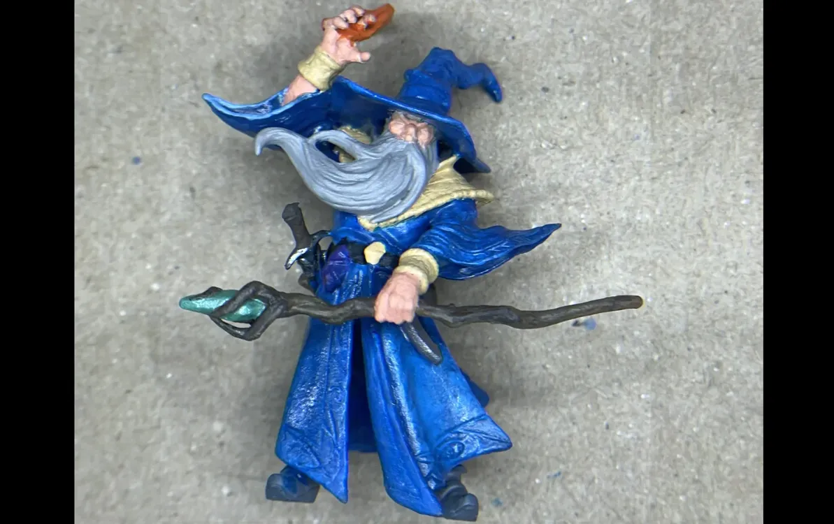Cornelius Greathat wizard miniature with its basecoat colors applied